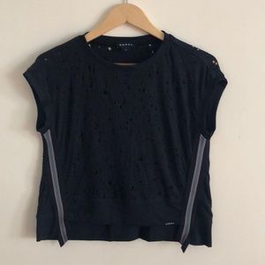 Black crop top. Distressed look.